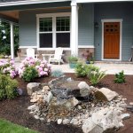 home exterior with plants on front porch
